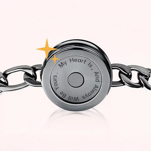 A zoomed-in view of the back of the bracelet, highlighting the inscription, “My Heart Is, And Always Will Be Yours,” with a shining star symbol for emphasis.